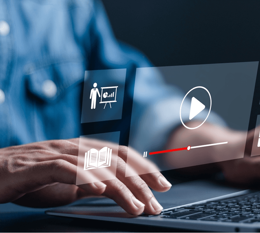 Video analysis dashboard illustration showing hands typing on laptop with video analytics interface